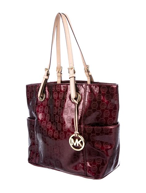 is michael kors bags real leather|are mk bags real leather.